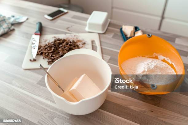 Chocolate Chips Butter And Flour Prepaired On A Kitchen Counter For Baking Stock Photo Stock Photo - Download Image Now