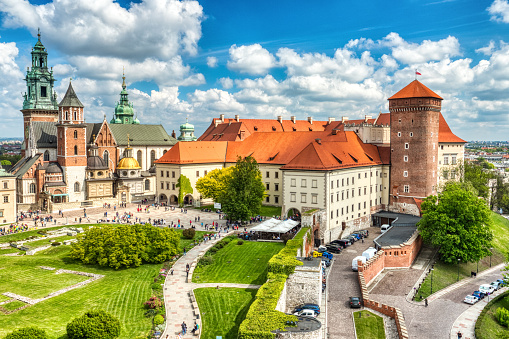 Krakow, Poland, city and capital of Malopolskie.St. Mary's Church, Wawel Cathedral, and Renek Glowny main square.