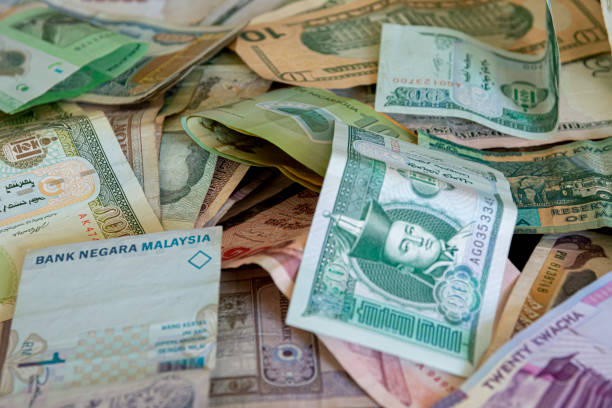 istock Different foreign currency money paper bank notes, randomly ordered 1186891859