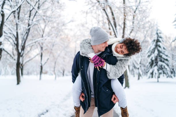 istock Piggyback ride in the snow 1186892141