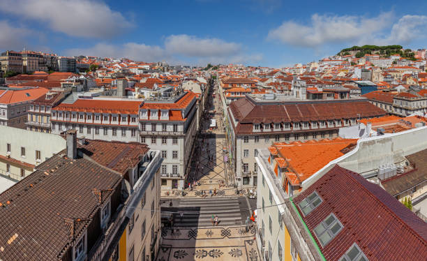Aerial view of Rua Augusta Street in the Baixa District of Lisbon, Portugal. The most cosmopolitan street of the capital is a landmark of the city. 18th century architecture Aerial view of Rua Augusta Street in the Baixa District of Lisbon, Portugal. The most cosmopolitan street of the capital is a landmark of the city. 18th century architecture baixa stock pictures, royalty-free photos & images