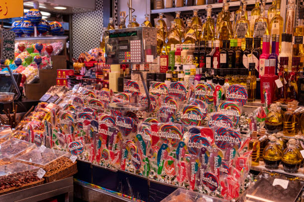 The Ramblas market of Barcelona, Spain with a sweet stall