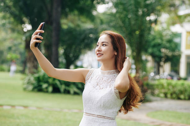 istock Lovely girl taking selfie 1186894936