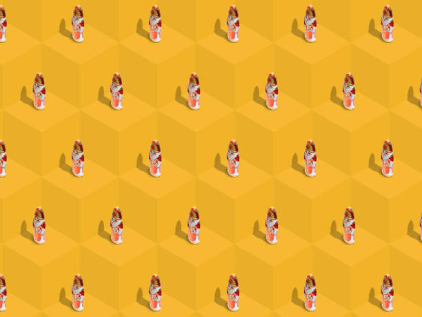 istock Colorful Sinterklaas / Santa Claus pattern , chocolate figurines. graphic Isometric perspective, pattern on a yellow background. Flat lay. cheerful, winter, postcard, wallpaper, wrapping paper. Trendy 1186896217