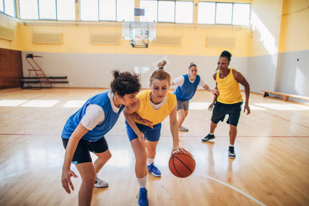 istock Women playing basketball 1186896680