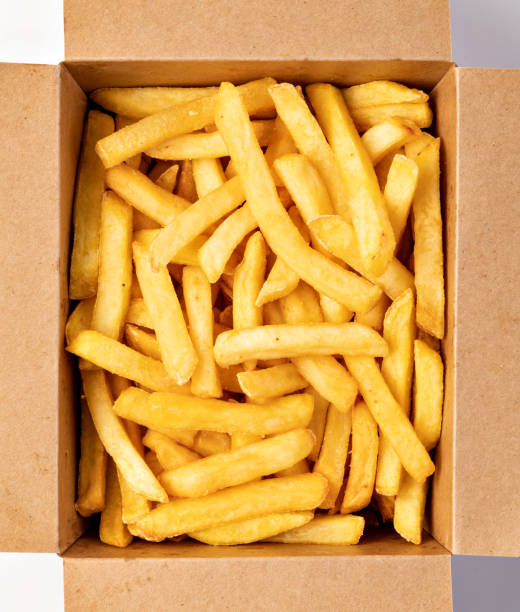 istock potato fry on white background 1186902013