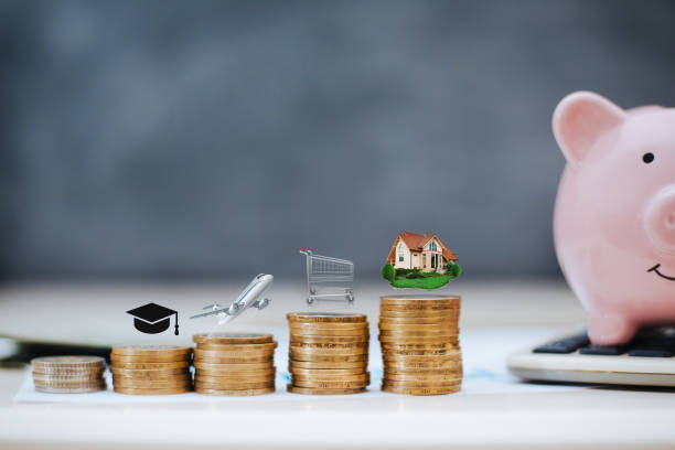 istock Expenses Icon On Stack Of Coins With Piggy Bank 1186902978
