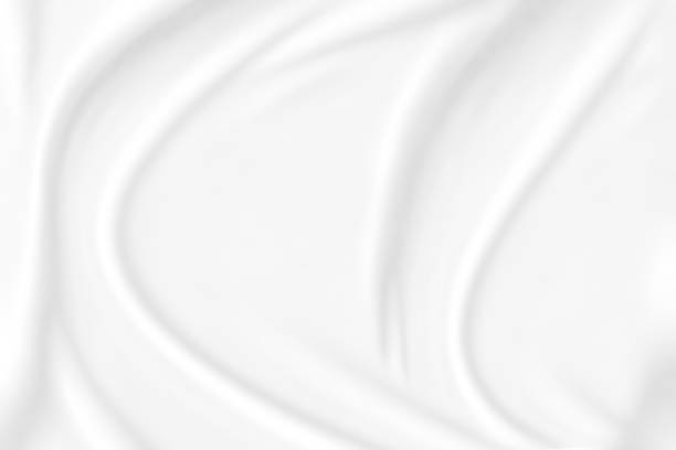 istock abstract smooth elegant white fabric texture background,flowing satin waves 1186904602