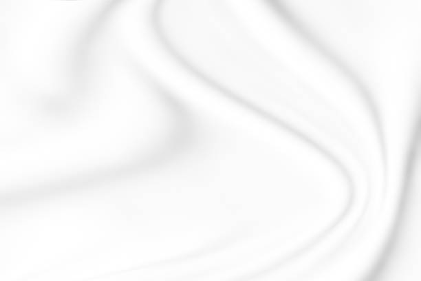 istock abstract smooth elegant white fabric texture background,flowing satin waves 1186904641