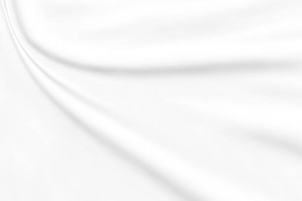 istock abstract smooth elegant white fabric texture background,flowing satin waves 1186904704