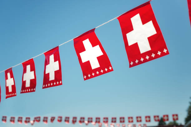 istock swiss flags hanging on national holiday on august 1st 1186905932