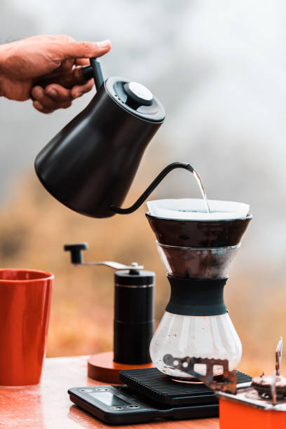 istock Barista brewing coffee, method pour over, drip coffee 1186906400
