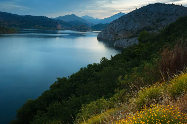 istock Mountains landscape with lake in twilight 1186906602