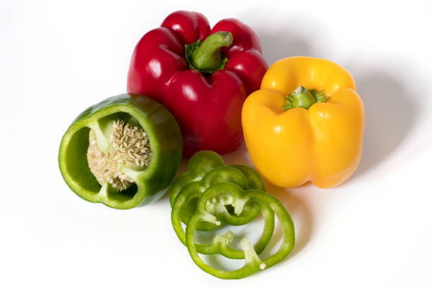 istock Fresh red green yellow Bell Pepper Slices on white background 1186908845