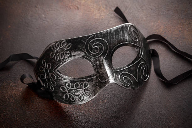 istock Carnival mask on a rusty background. Masquerade 1186912183