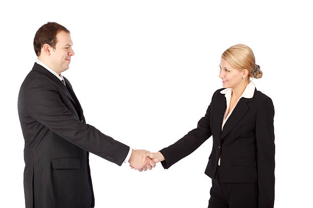 istock Man and woman business handshake 118691330