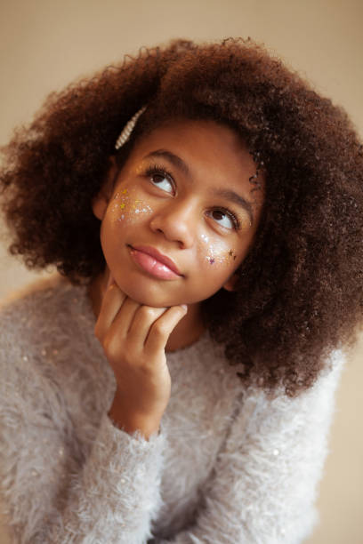 istock Cute beautiful girl with shiny makeup 1186914781