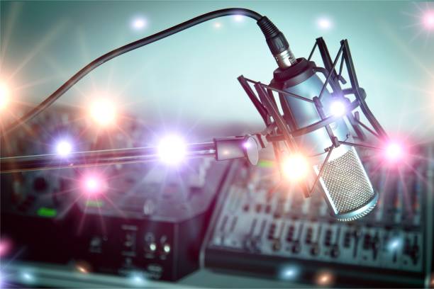 Radio. Microphone and  digital studio mixer  on background home recording studio setup stock pictures, royalty-free photos & images