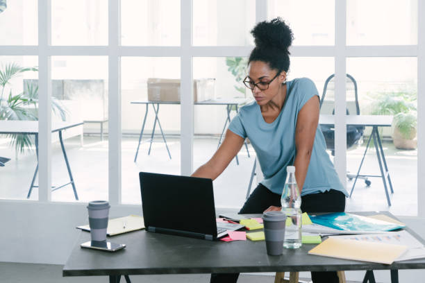 Businesswoman using laptop
