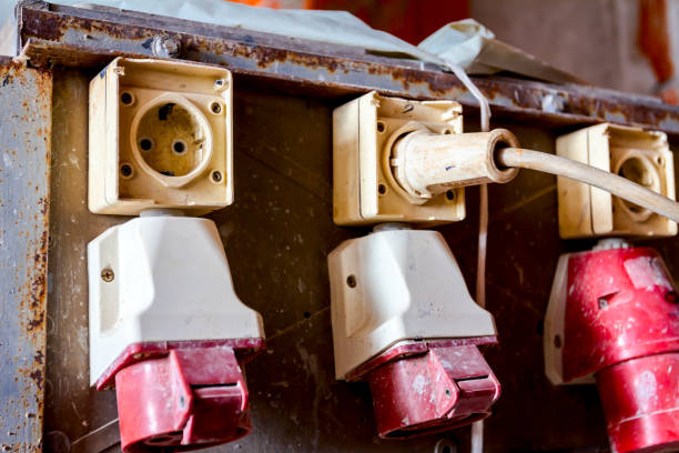 istock Industrial power outlets, electric plug in, at construction site 1186918896