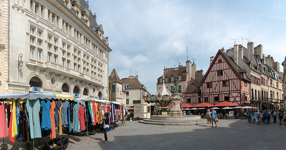 Dijon, Burgundy / France - 27 August 2019: market day on the Francois Rude Square in the historic old city center of Dijon