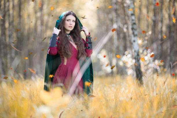 istock Elf woman in the autumn forest 1186919225