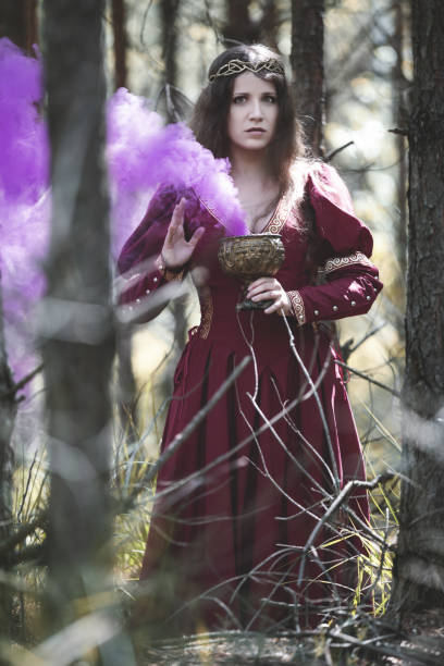 istock Elven sorceress in the forest 1186919240