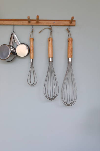 istock cooking kitchenware hanging on wall in kitchen room 1186919459