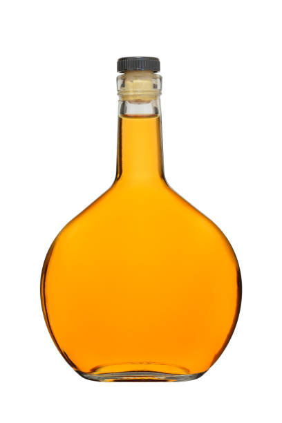 istock Bottle of cognac closed with a cork on a white background 1186919586