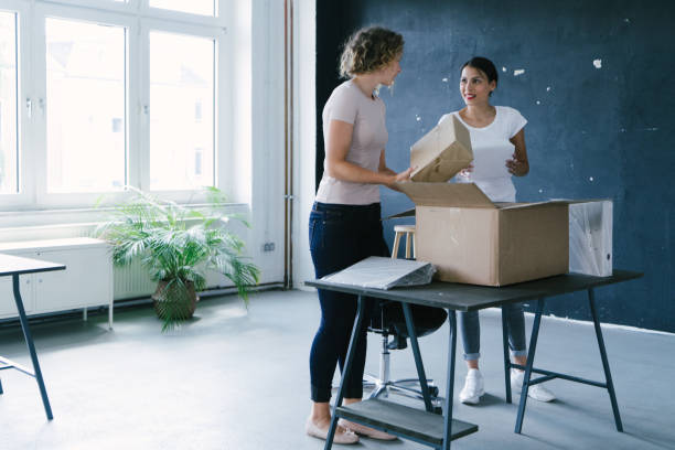 istock Young entrepreneurs moving into a new office 1186921672