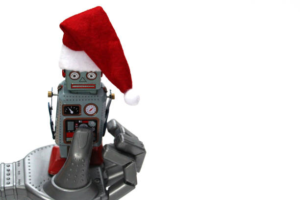istock The robot holds a small retro robot in his hand. 1186923115