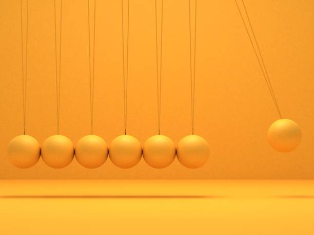 yellow newton balance balance pendulum stock pictures, royalty-free photos & images