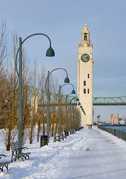 istock winter park by river clock tower snow Montreal 118692557