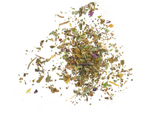 istock Some chopped, mixed herbs isolated on white background with copy space for text, images. Spices. Packaging concept. Close-up, top view 1186931182