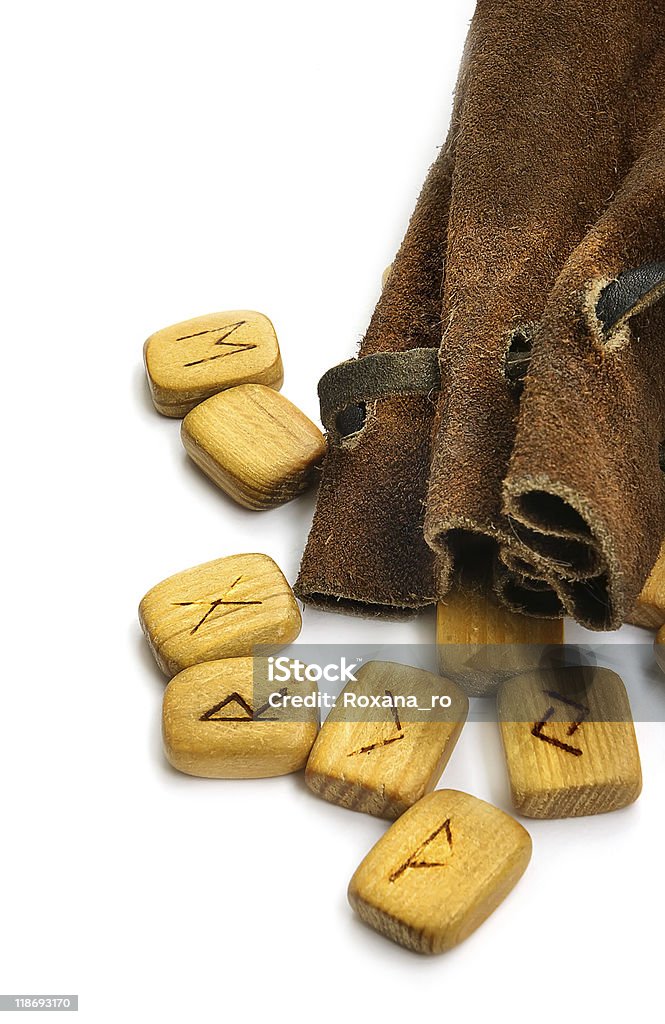 Runes in leather sack Wooden old  runes in rough leather sack Ancient Stock Photo