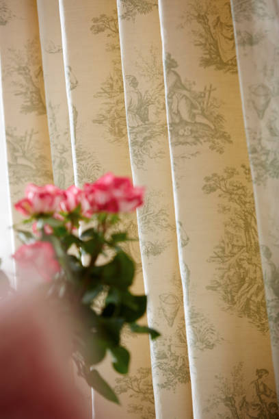 istock Door curtains with roses 1186932442