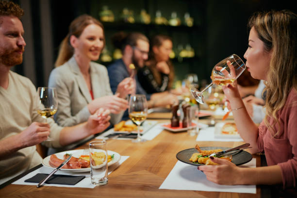 istock Friends having diner at restaurant. 1186932483