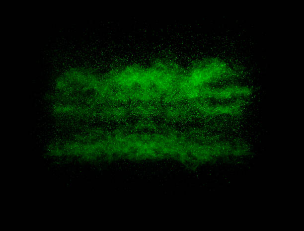 istock Green color powder explosion cloud on black background.Green dust splash. 1186932834