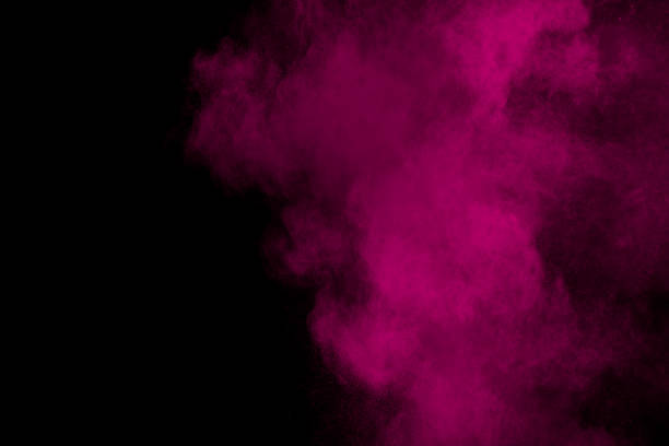 istock Pink powder explosion on black background.Pink dust splash cloud on dark background. 1186932891