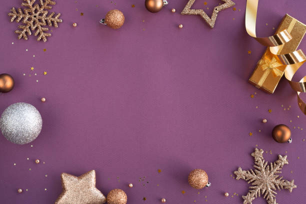 istock Christmas frame of golden ornaments 1186933456
