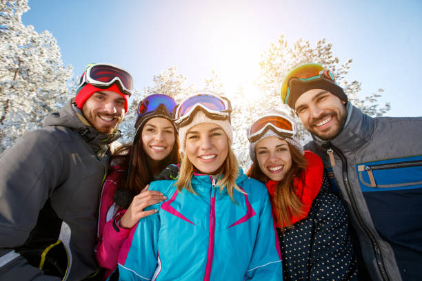 istock smiling friends on winter vacation 1186934574