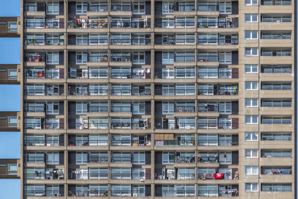 London high rise trellick tower block showing exterior and balconies Facade of a Brutalist style tower block, trellick tower, in London trellick tower stock pictures, royalty-free photos & images