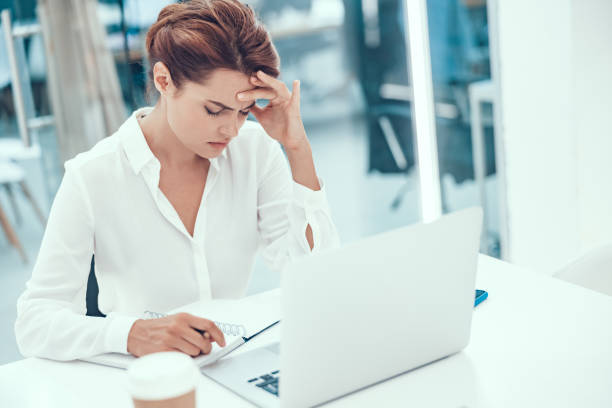 istock Tired after long working day stock photo 1186937318