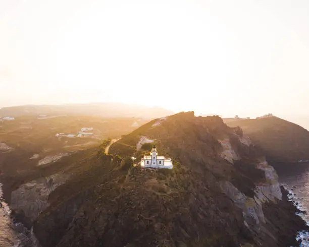 Santorini Lighthouse Aerial Shot Sunrise Dramatic Travel