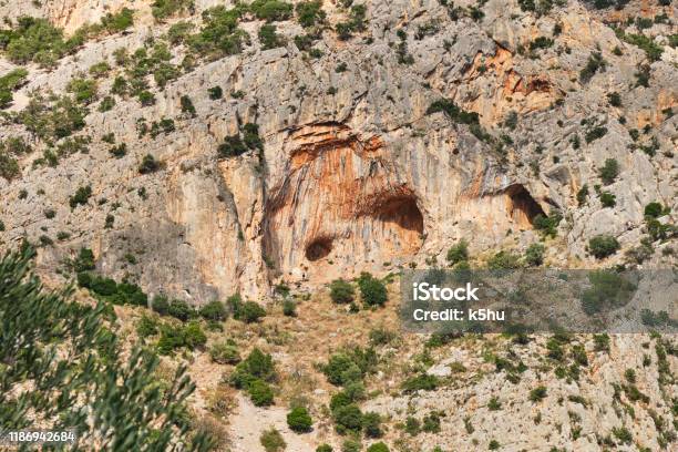 Twin Caves Climbing Sector In Leonidio Arcadia Peloponnese Greece With Red Limestone Rock Stock Photo - Download Image Now