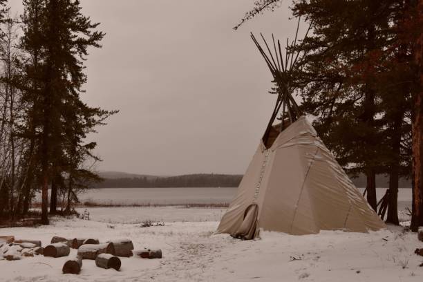 istock Native American Tipi in a Canadian Forest 1186943776