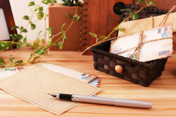 istock Stationery paper and pen 1186945037