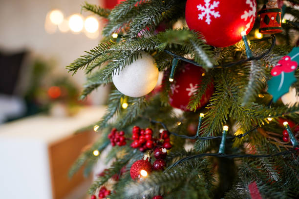 istock Christmas tree background and decorations with blurred, sparking, glowing. Happy New Year theme 1186945258
