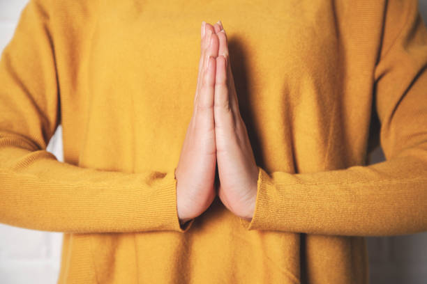 istock prayer woman hand 1186945495