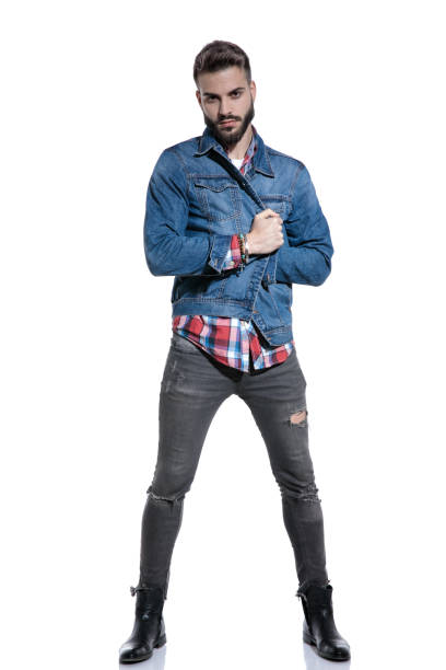 istock dramatic cool guy wearing checkered plaid shirt and jeans jacket 1186947318
